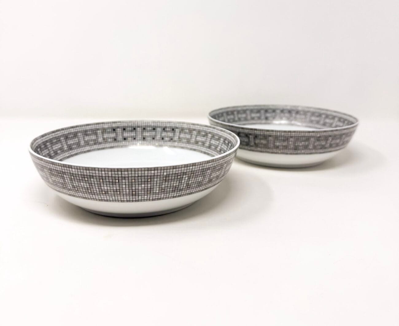 Side view of Hermès Mosaique au 24 porcelain dessert bowls set of two