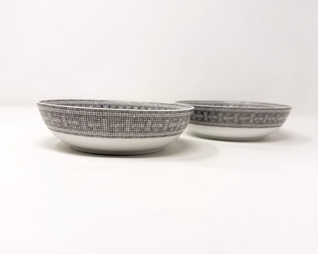 Side view of Hermès Mosaique au 24 porcelain dessert bowls set of two