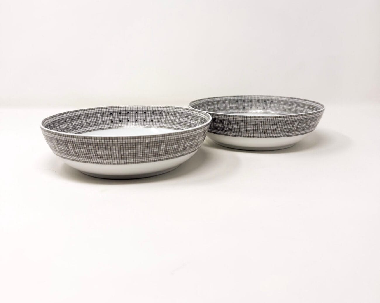 Side view of Hermès Mosaique au 24 porcelain dessert bowls set of two