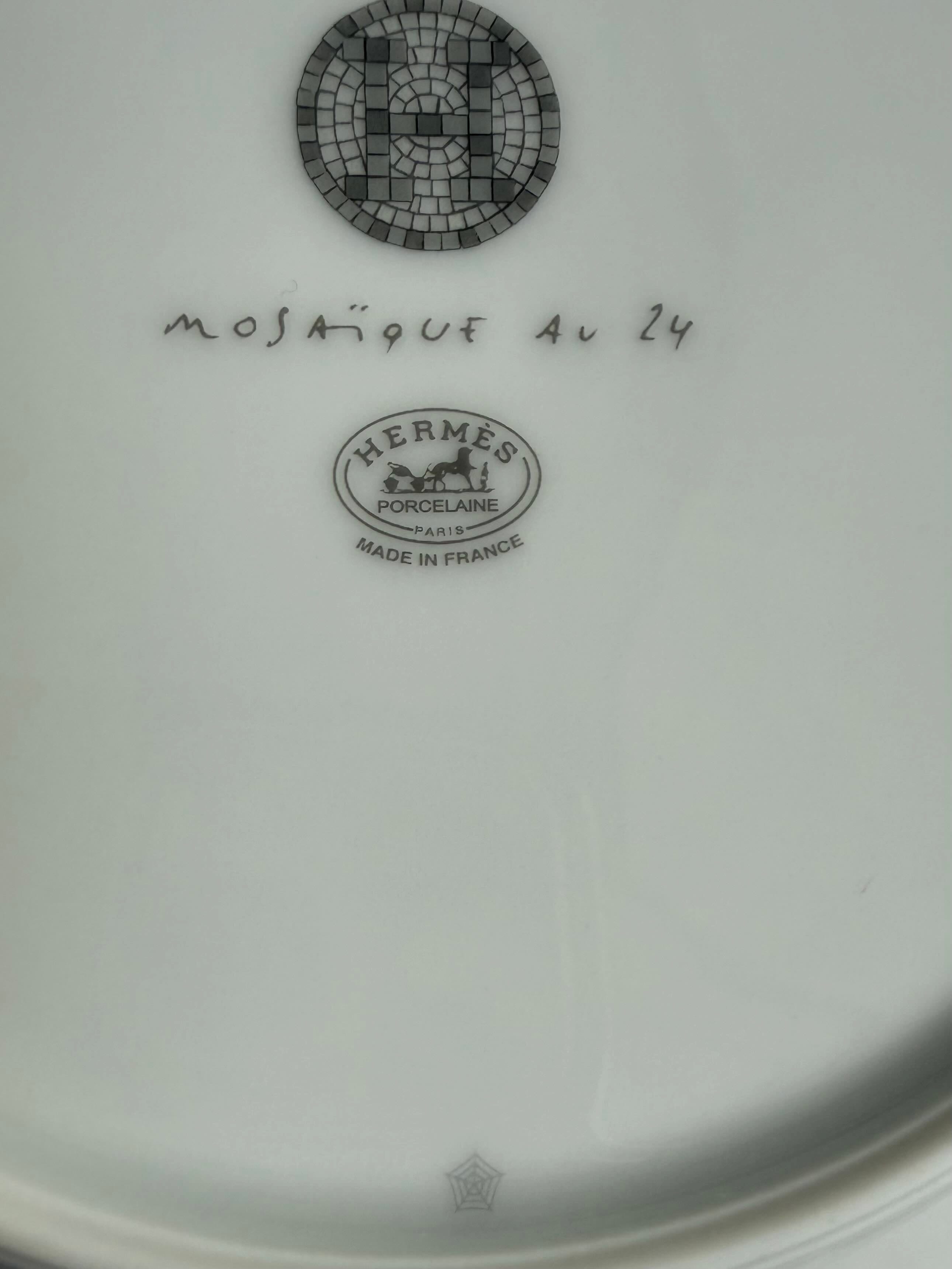 Authentic Hermès Mosaique au 24 Platinum production mark beneath the logo with workshop symbol