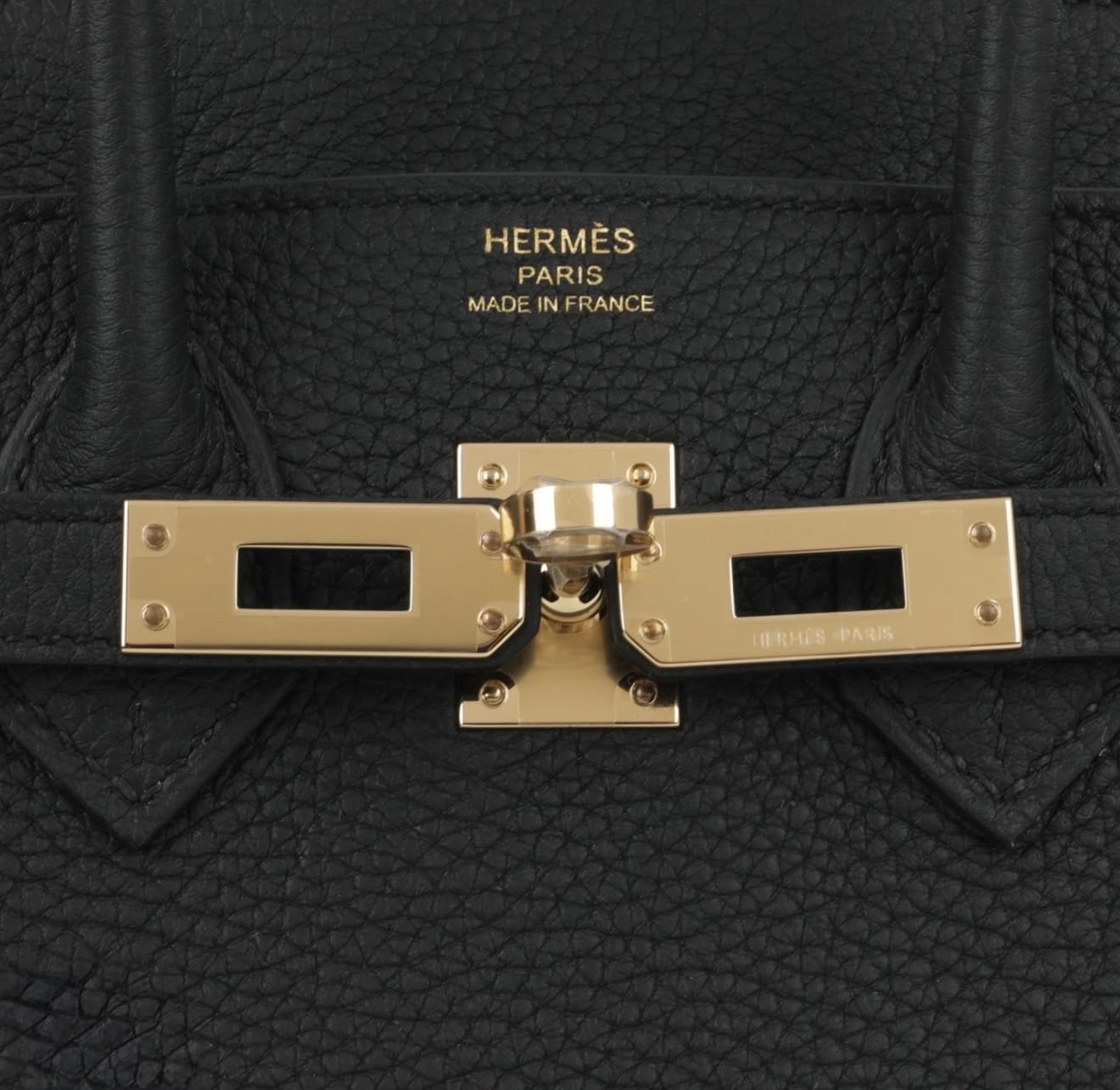 Close-up of Hermès Permabrass Hardware (PBHW) turn-lock closure