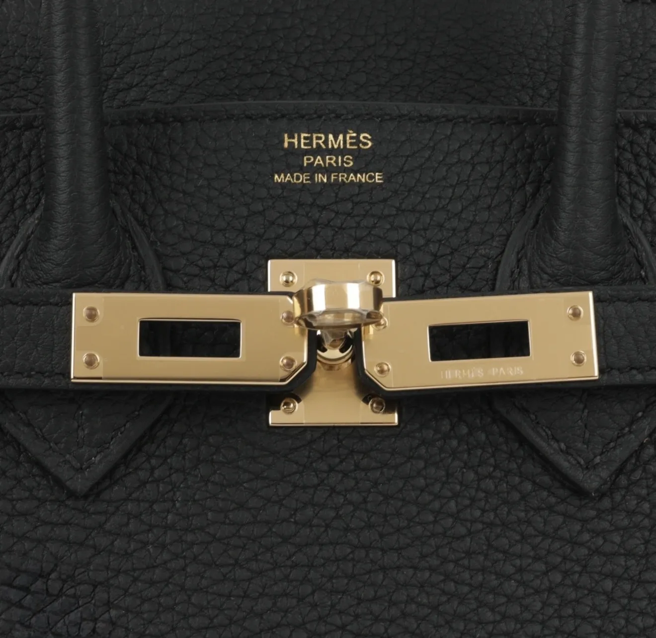 Close-up of Hermès Permabrass Hardware (PBHW) turn-lock closure