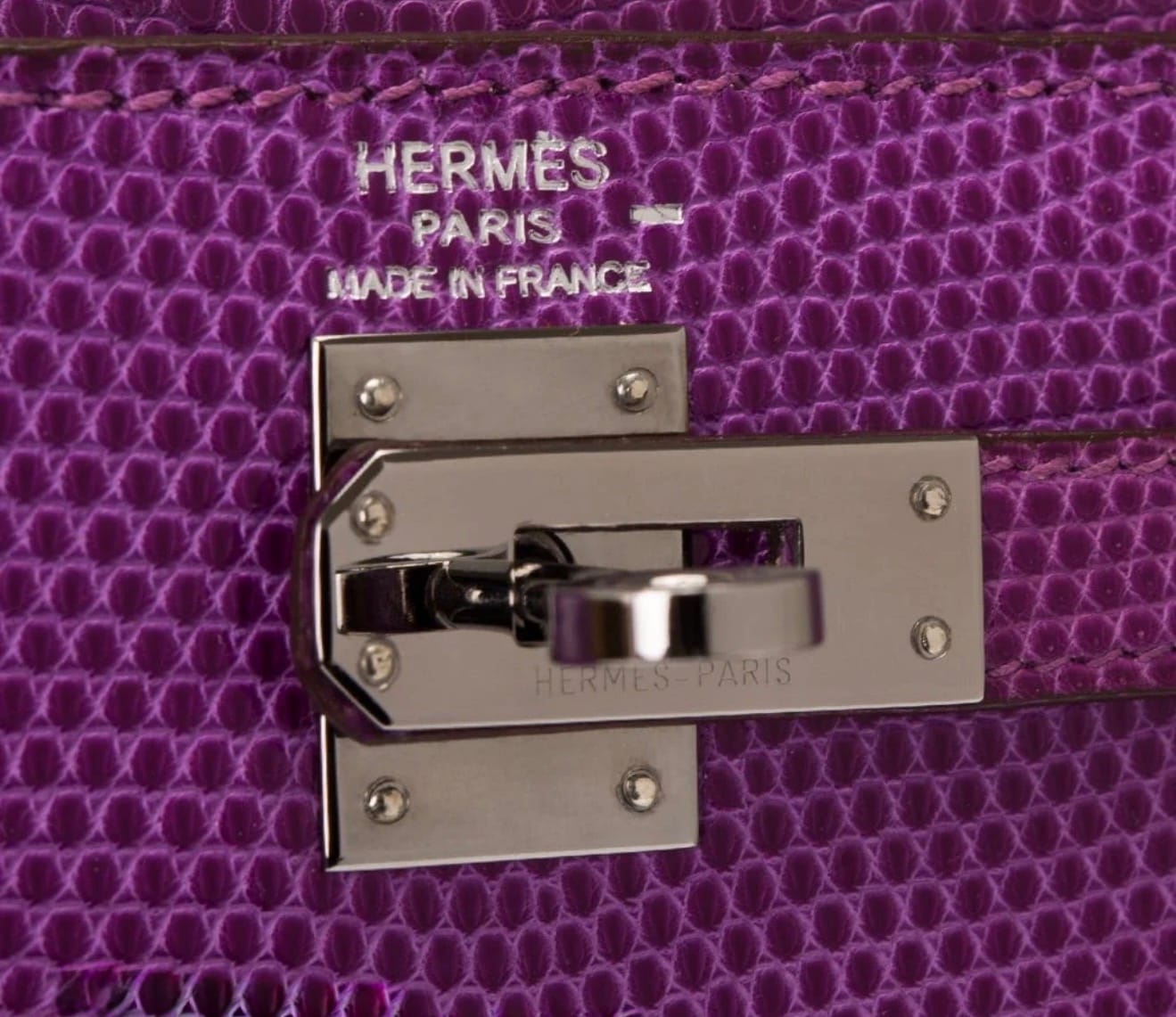 Close-up of Hermès Ruthenium Hardware (RHW) turn-lock closure