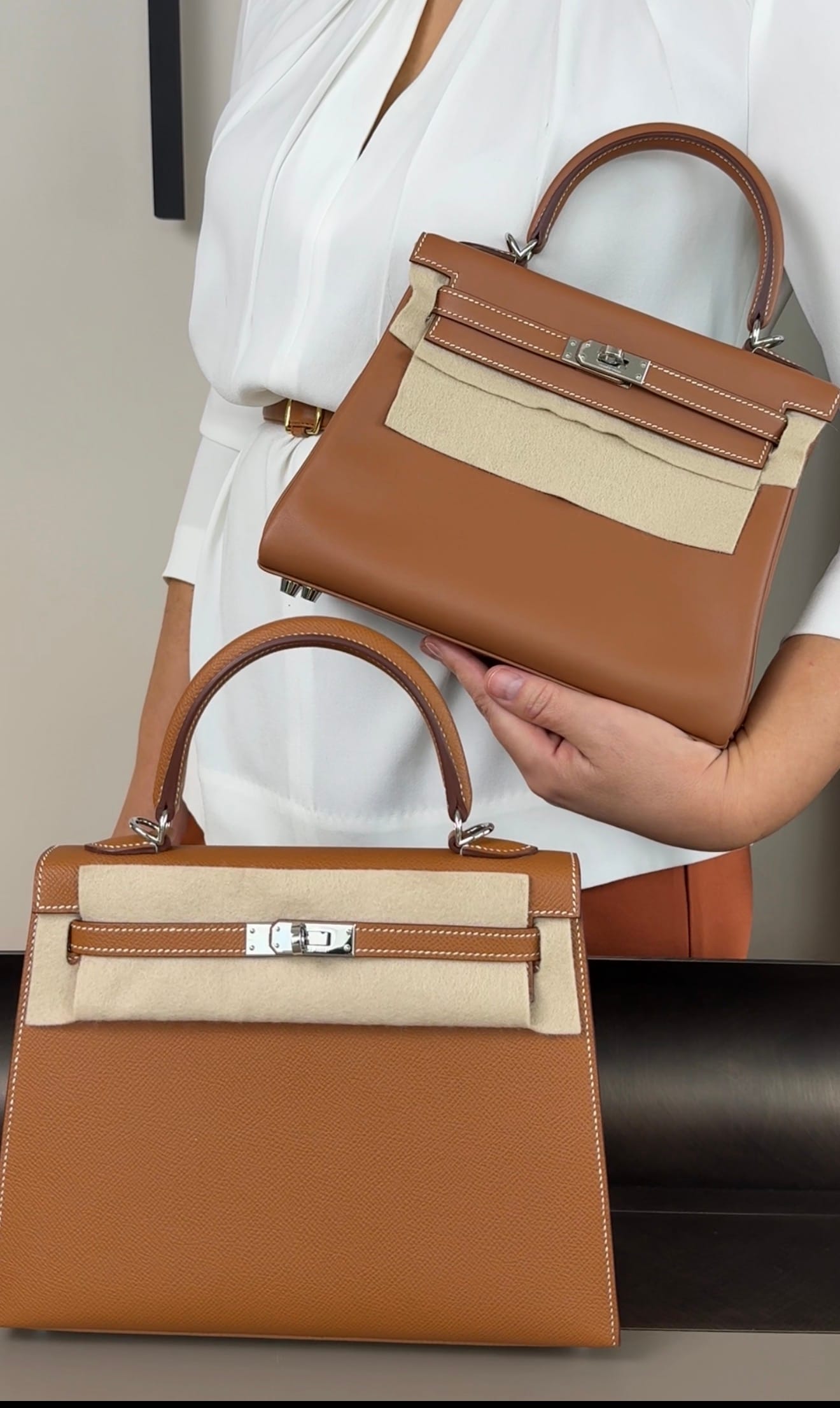 Hermès Kelly Sellier vs Retourne in Gold leather showing the difference between structured and relaxed construction