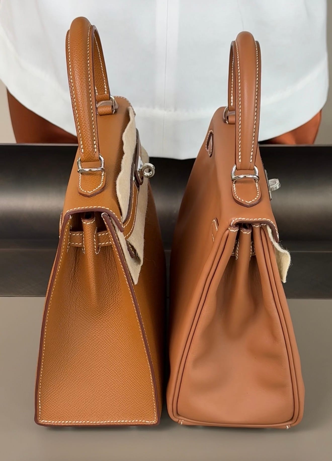 Side profile comparison of Hermès Kelly Sellier and Kelly Retourne showing the difference in side construction