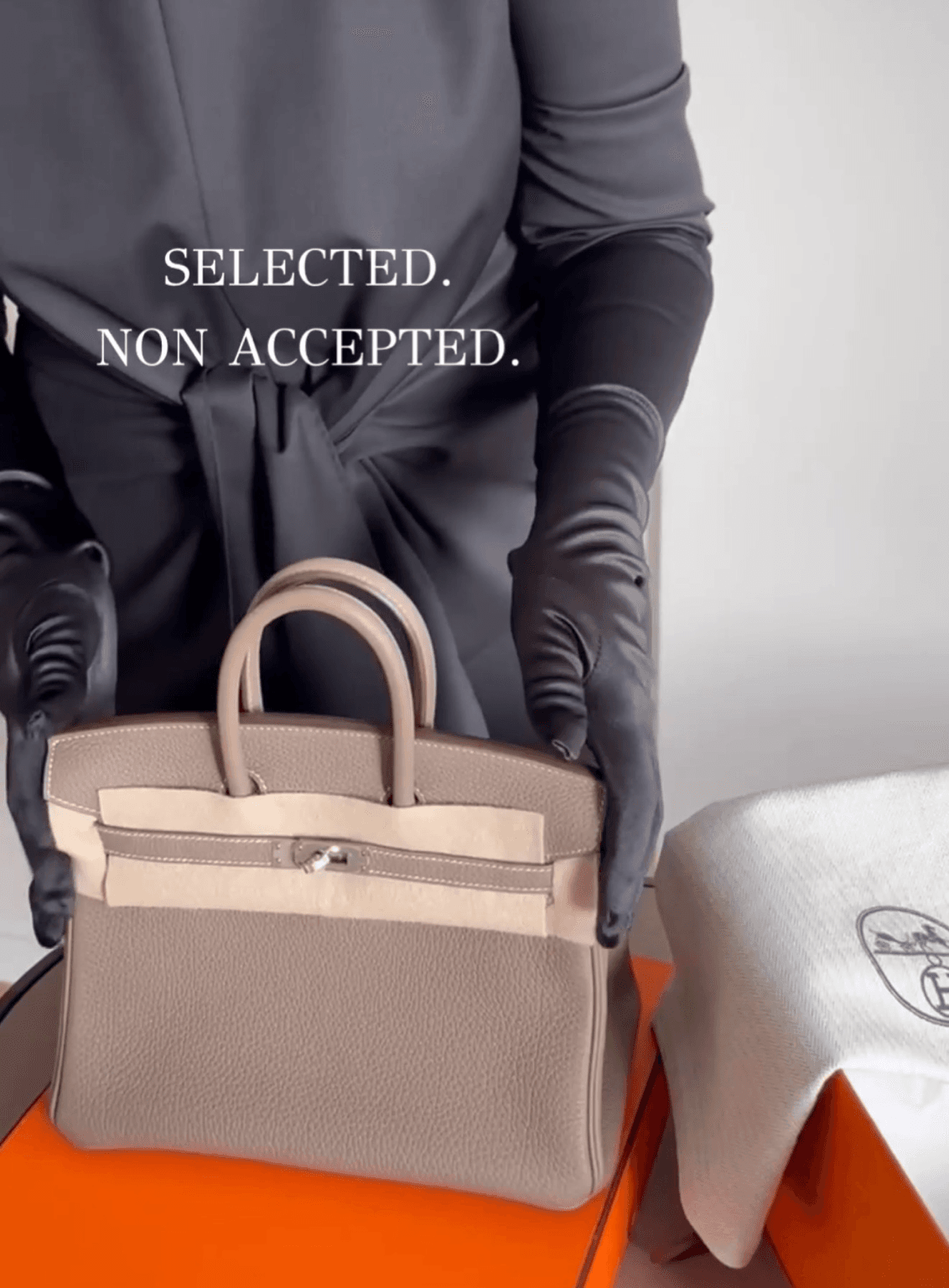 Bagotica inspecting a pre-owned Hermès Birkin bag