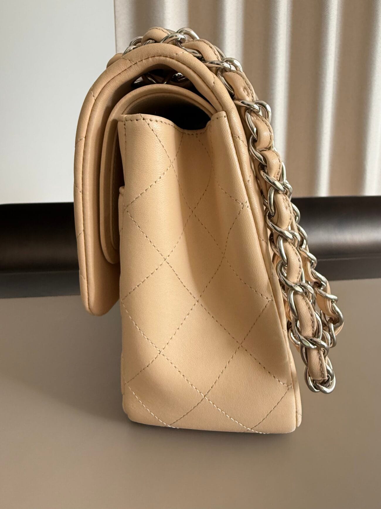 Chanel Classic Flap Jumbo 30 Light Beige Lambskin with Palladium Hardware – side silhouette and chain