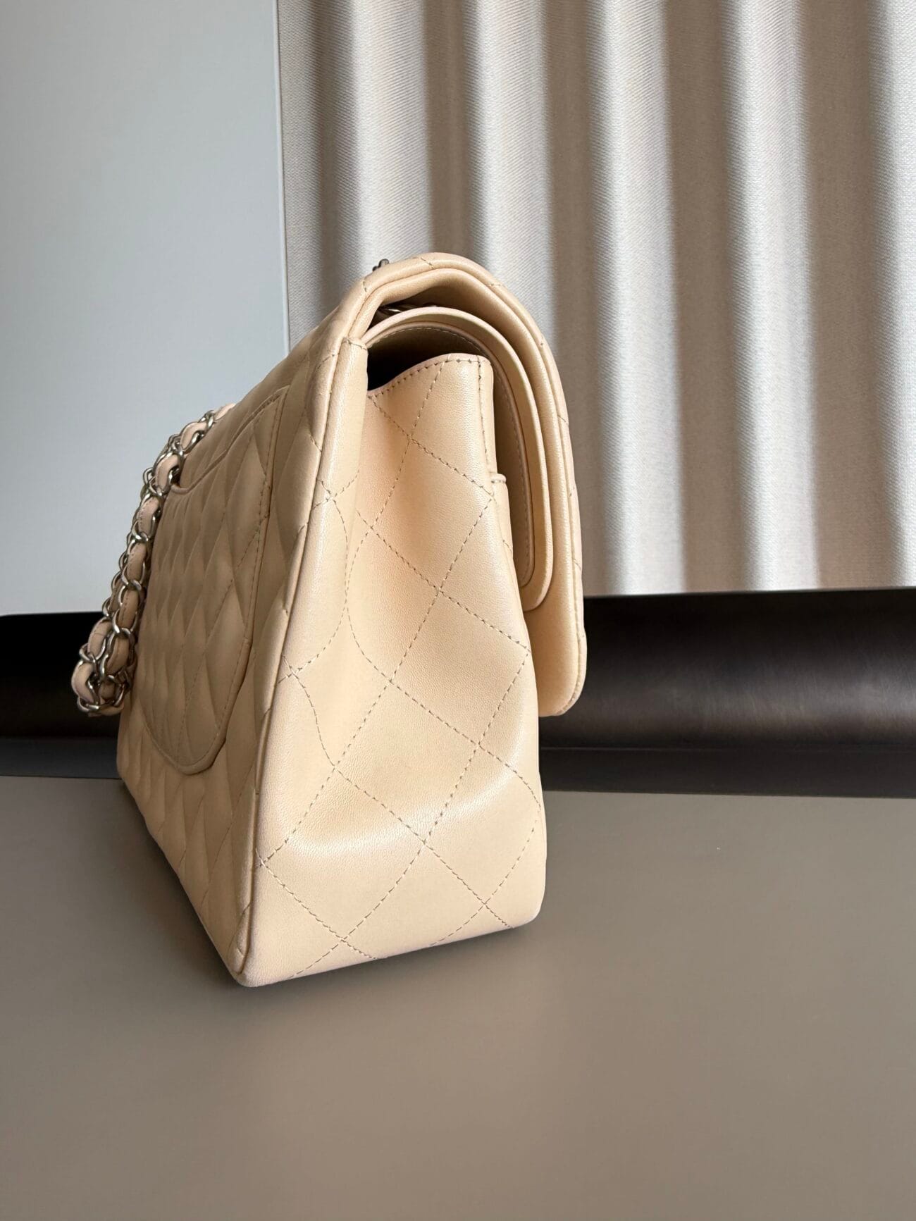 Chanel Classic Flap Jumbo 30 Light Beige Lambskin with Palladium Hardware – three-quarter view
