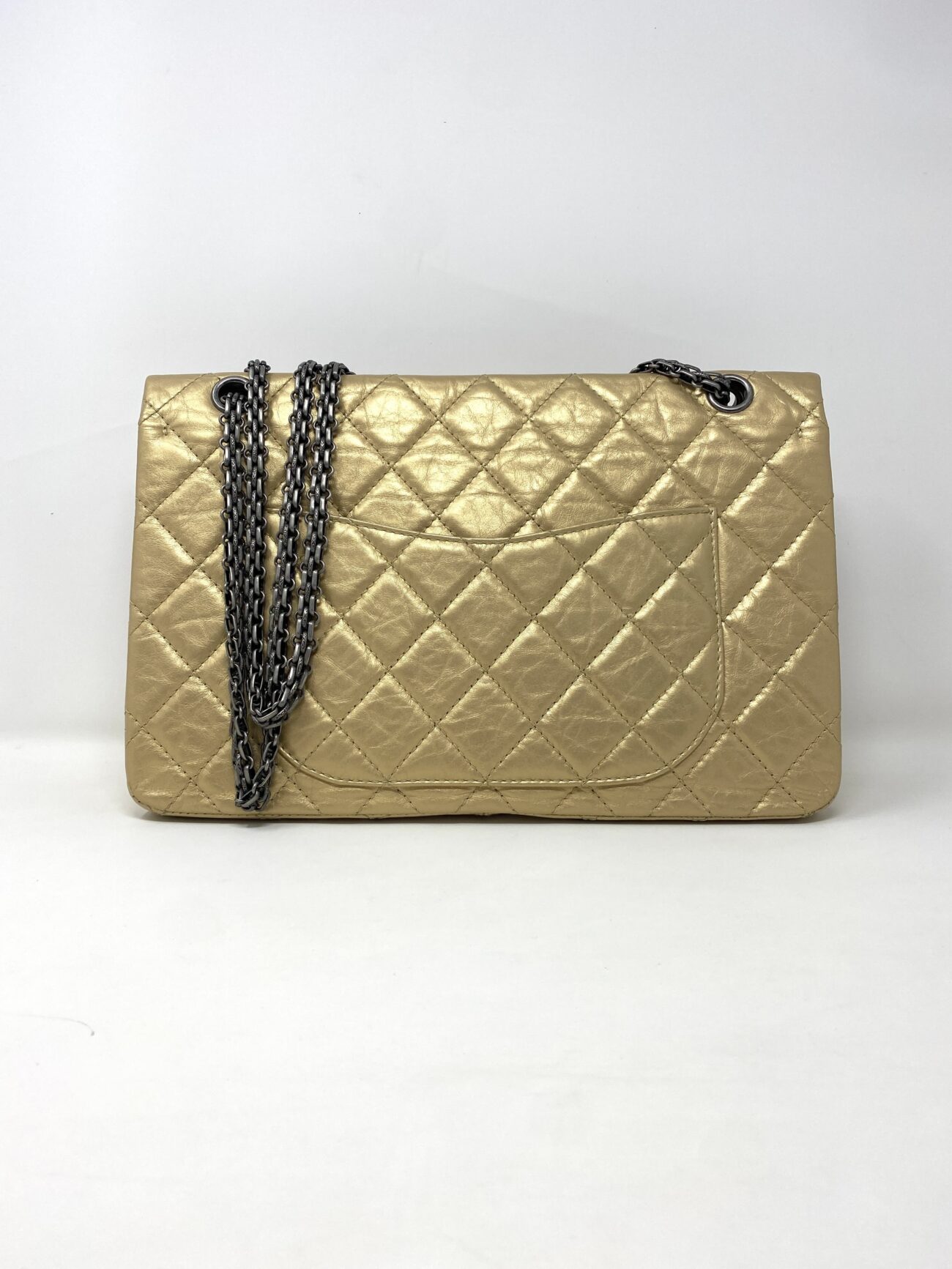 Chanel 2.55 Reissue gold aged calfskin bag, rear view featuring diamond quilting, Mona Lisa pocket and antique silver chain strap